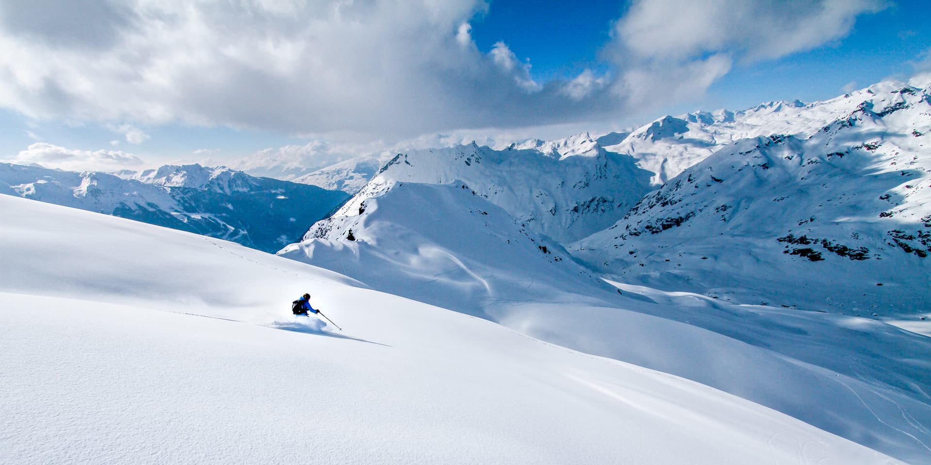 Lone off piste skier in Sainte-Foy-Tarentaise making fresh tracks